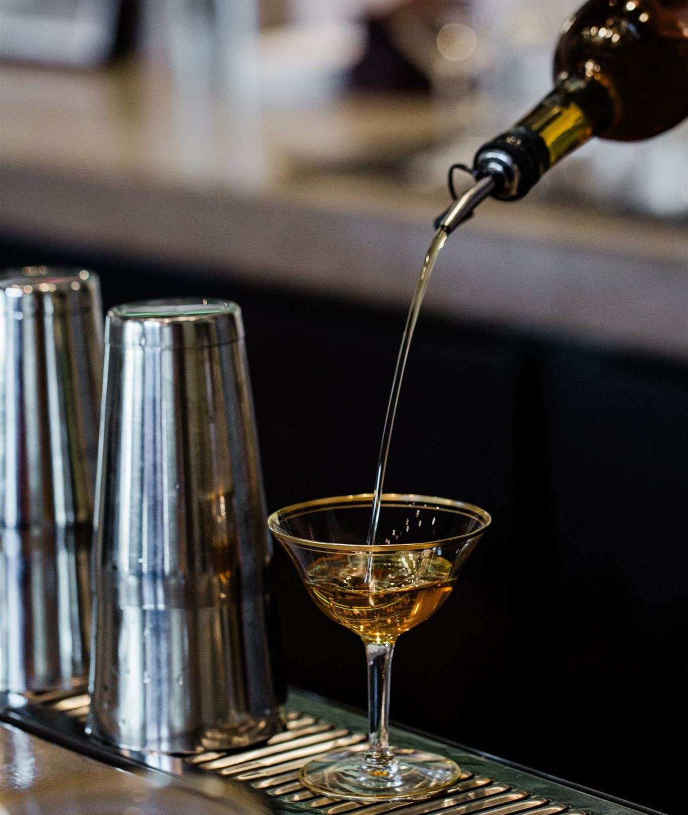 Cocktail being poured